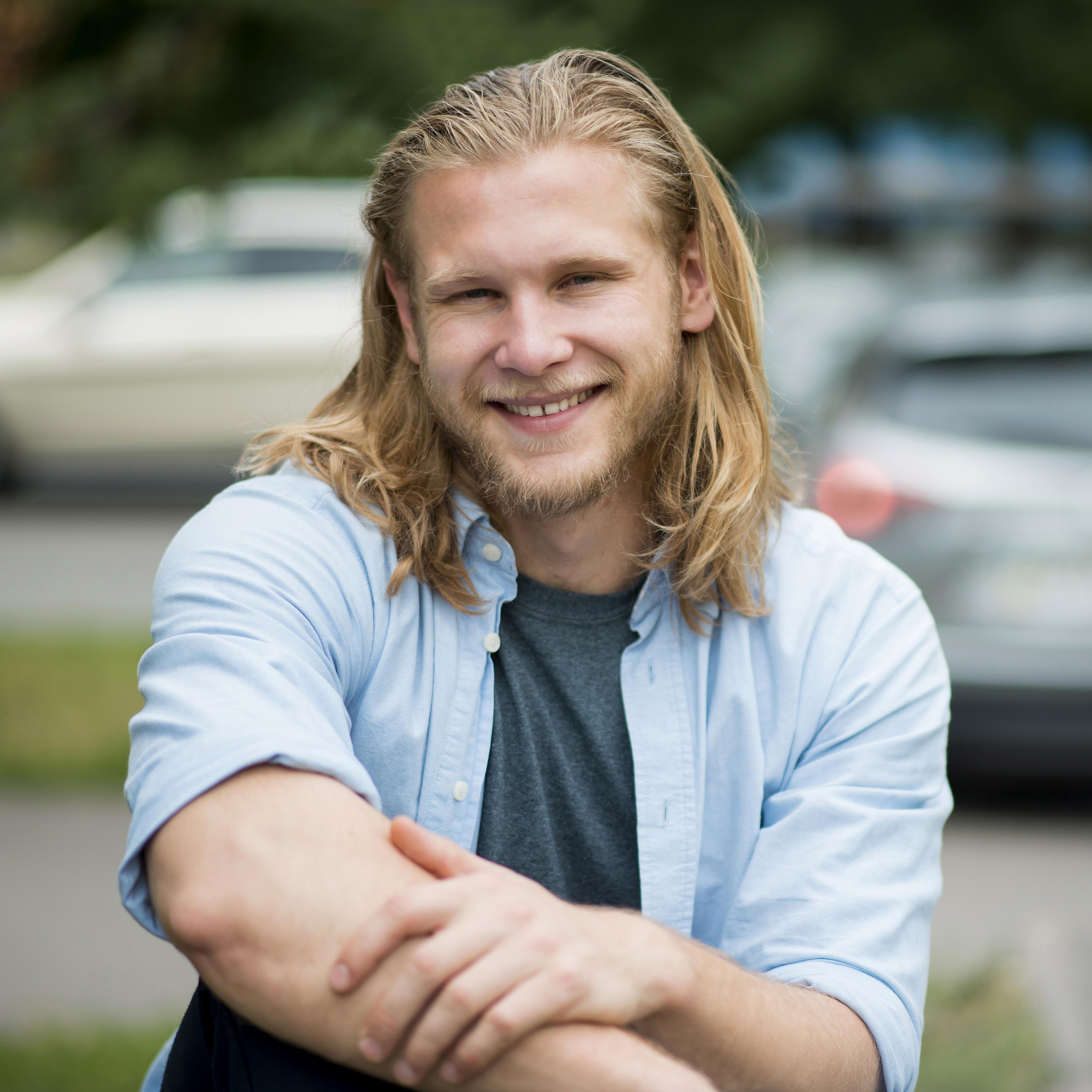 files/front-view-smiley-man-outdoors.jpg